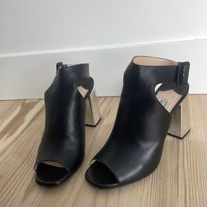Prada Black Mules with Silver heel